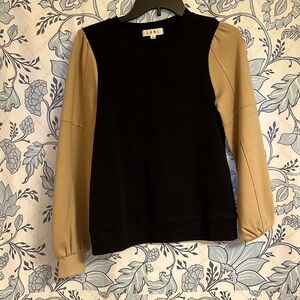 Tan and black blouse